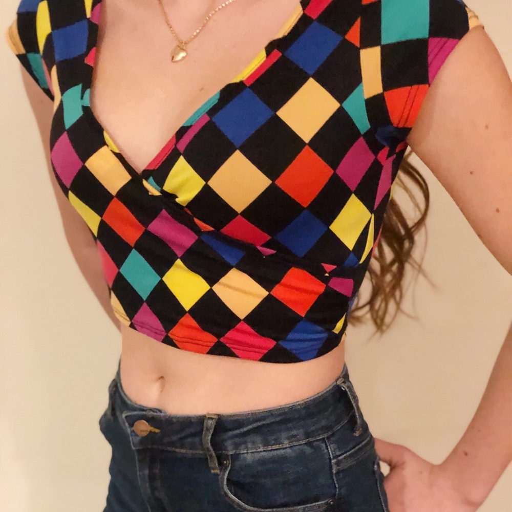 Colorful checkered crop top shown worn in reverse